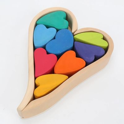 Arcobaleno di legno nordico di Jenga che impila le particelle elementari di legno naturali