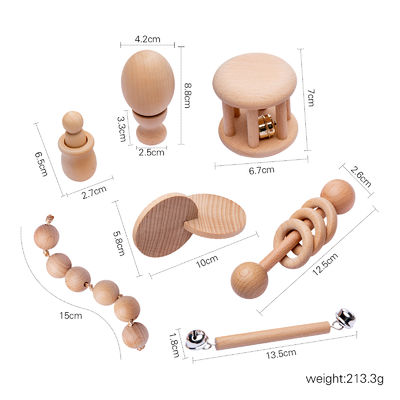Il grafico crepita 7Pc Teether di legno per l'anello mettente i denti di legno del bambino