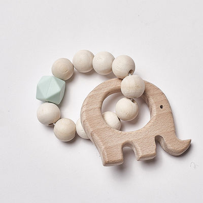 I gioielli lavorano all'uncinetto Ring Personalised Organic Wooden Teethers mettente i denti