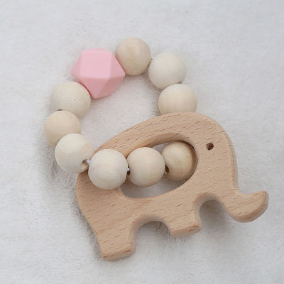 I gioielli lavorano all'uncinetto Ring Personalised Organic Wooden Teethers mettente i denti
