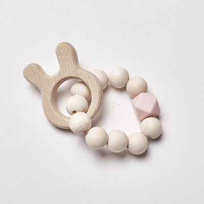 I gioielli lavorano all'uncinetto Ring Personalised Organic Wooden Teethers mettente i denti