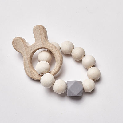 I gioielli lavorano all'uncinetto Ring Personalised Organic Wooden Teethers mettente i denti
