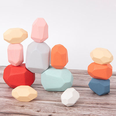 Le pietre di legno delle particelle elementari del bambino delle rocce 190g mette Montessori
