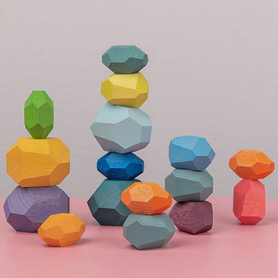 Le pietre di legno delle particelle elementari del bambino delle rocce 190g mette Montessori