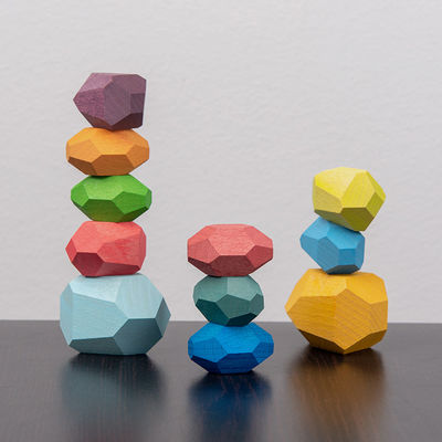 Le pietre di legno delle particelle elementari del bambino delle rocce 190g mette Montessori