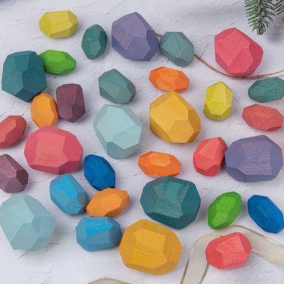 Le pietre di legno delle particelle elementari del bambino delle rocce 190g mette Montessori