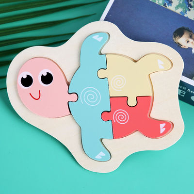 Il puzzle di legno del blocchetto di Macaron 3D gioca i blocchi animali di legno