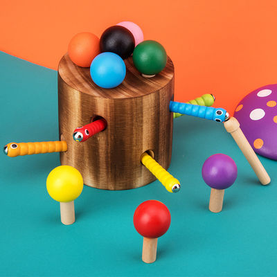 Fermo di legno il gioco del verme per addestramento della coordinazione mano-occhio dei bambini
