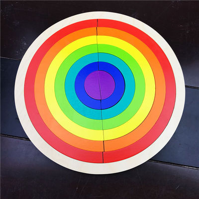 Blocchetti di legno di puzzle dell'arcobaleno di sviluppo di prima infanzia
