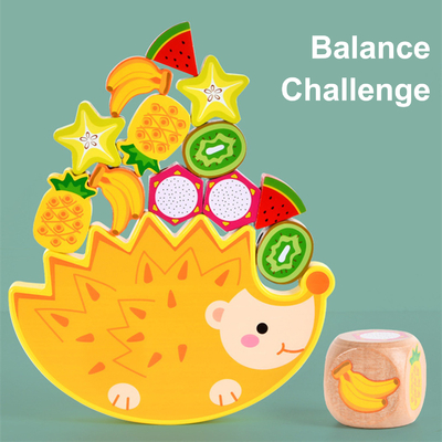 La frutta animale d'impilamento di legno dell'istrice del fumetto dei giocattoli della particella elementare dell'equilibrio blocca i giocattoli di Montessori dei giochi dell'equilibrio