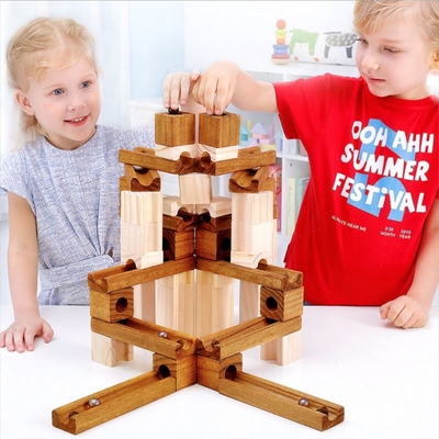 regalo educativo dei bambini dei giocattoli di pista 60pcs dell'Assemblea delle particelle elementari della palla dei bambini di marmo di legno di puzzle