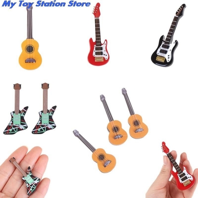 Chitarra elettrica miniatura di musica della casa delle bambole di 1:12 per i bambini Toy House Decor musicale