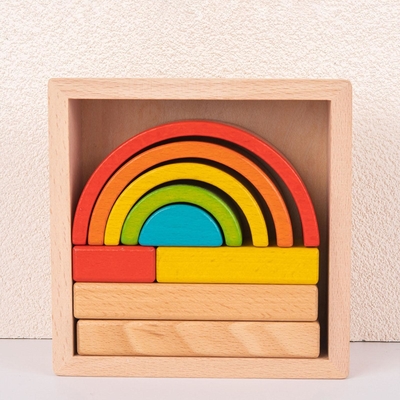 Il puzzle di legno di incastramento dell'impilatore blocca Montessori che impila il gioco per la scuola materna