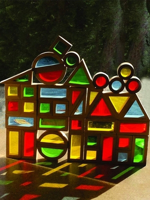 L'impilamento di legno dell'arcobaleno blocca l'apprendimento variopinto creativo ed educativo